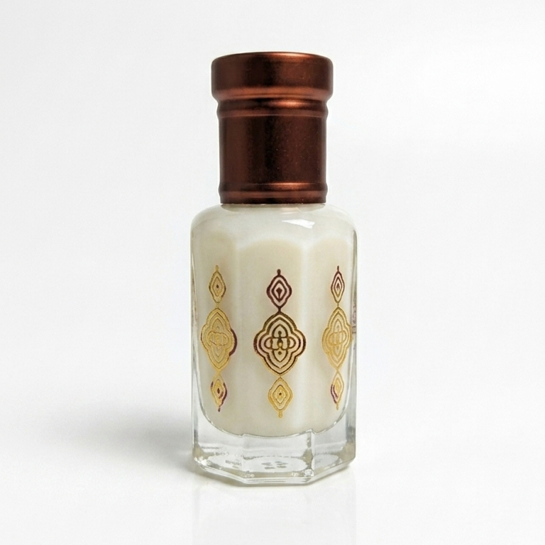 Small bottle with a decorative cap on a white background