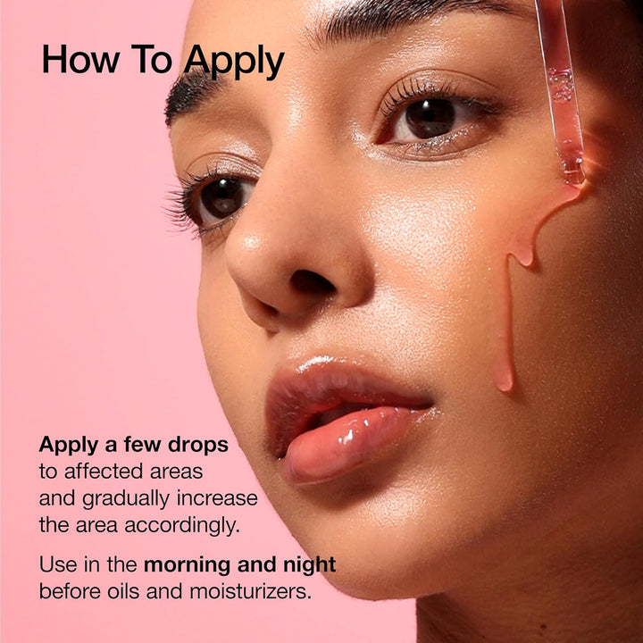 Close-up of a woman's face with text on how to apply a product, against a pink background.