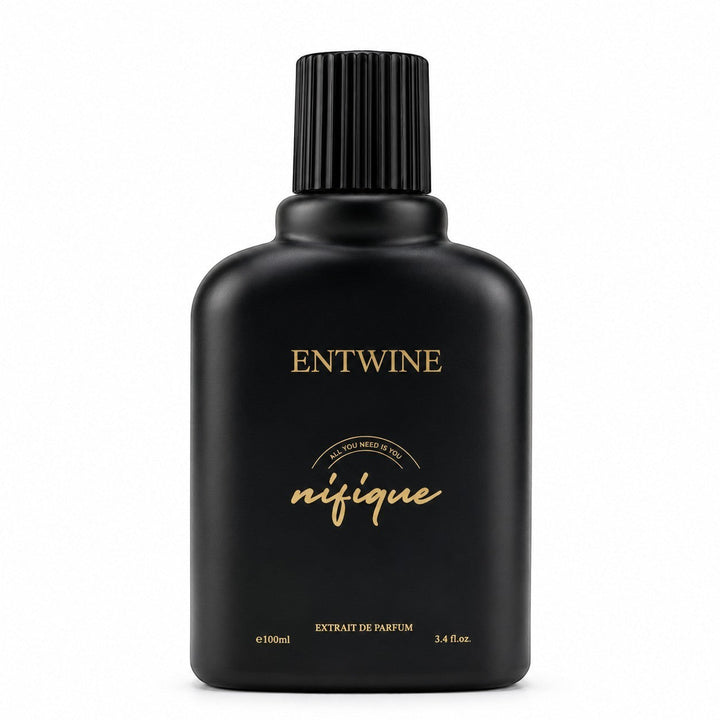 Black perfume bottle with gold text on a white background