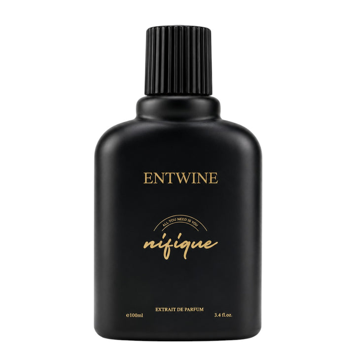 Black perfume bottle with gold text on a white background