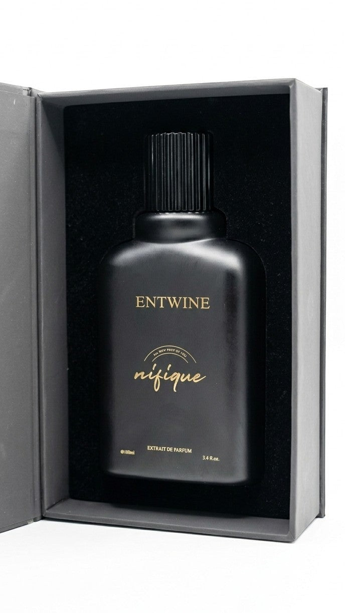 Nifique Entwine M010 Amber Oud Extrait de Parfum in a sleek matte black 100ml bottle inside a luxury presentation box.