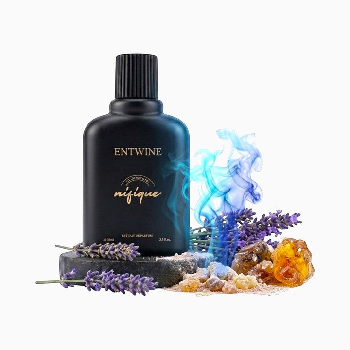 Nifique Entwine M031 Khaltate Arabiya extrait de parfum in a black bottle with lavender and frankincense resin.