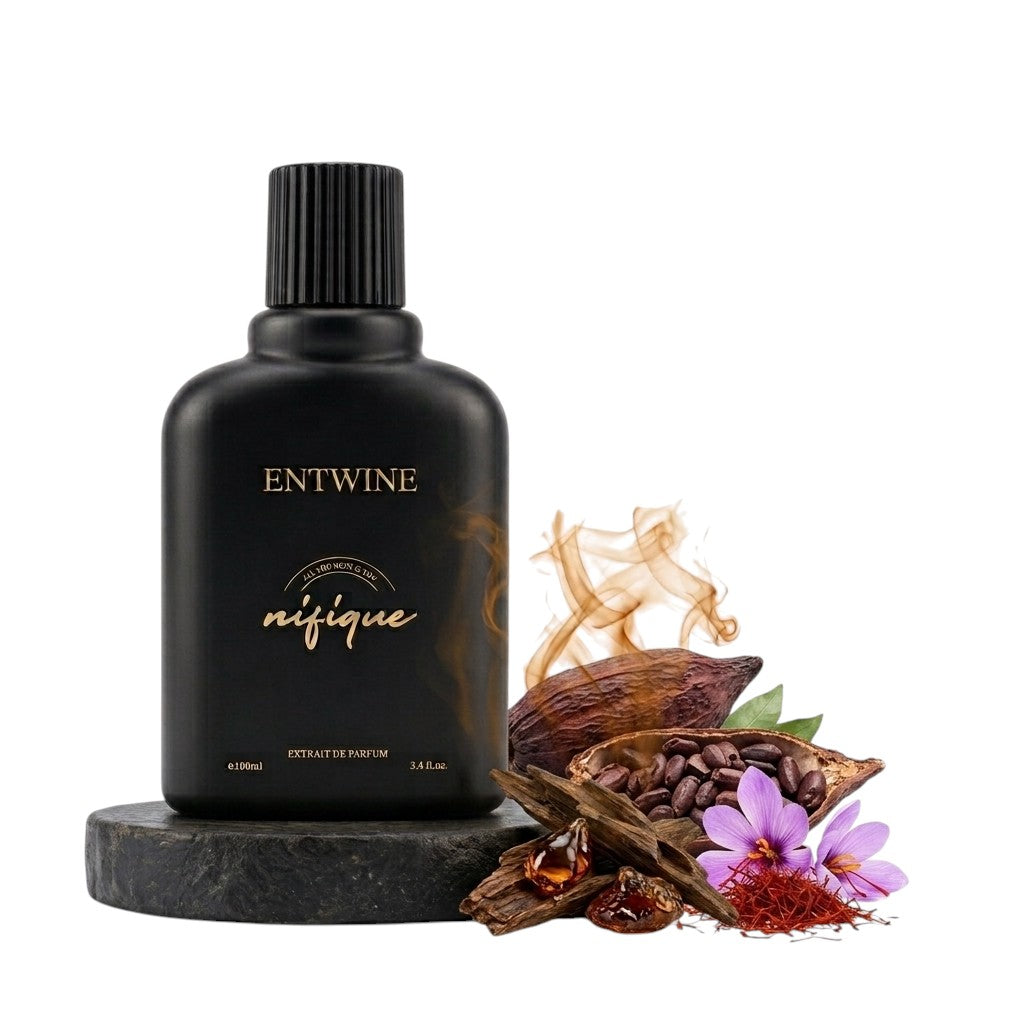 Nifique Entwine M011 Nouve Monde 100ml perfume in a matte black bottle with cocoa, saffron, and oud ingredients.