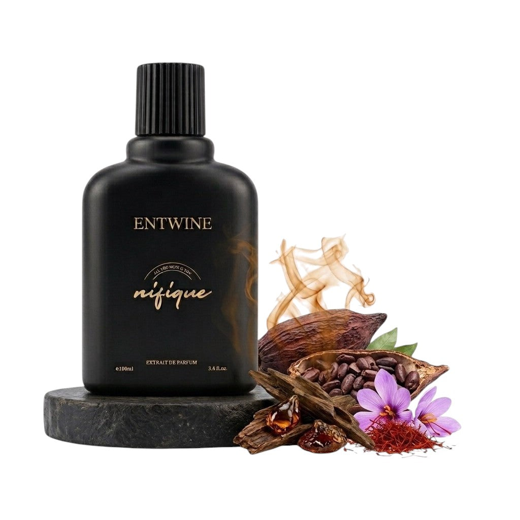 Nifique Entwine M011 Nouve Monde 100ml perfume in a matte black bottle with cocoa, saffron, and oud ingredients.